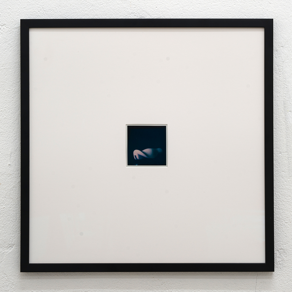 <em>Handle #4,</em> Polaroid sx-70, 40x40 cm, (framed) 8,1x8,4 cm (unframed), 2024.